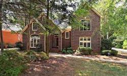 Beautiful all brick custome home with a wooded and private back yard. A bridge accross a small creek to a fenced yard - the kids loved it. Formal living room and great room. Georgeous kitchen with granite countertops and stainless steel appliances. Master