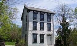 MAKE AN OFFER. . .Solid stone 3-story colonial with newer roof and windows. Interior needs rehab. Selling "As Is". Zoned village commercial; offers any possibilities for professional/business opportunities. Frontage on Rt. 29 and Perkiomenville Roads.