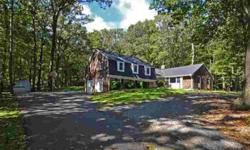 Lovely Dutch Col/Split w/picture-perfect setting situated on Randolph border in one of Parsippanys most desirable neighborhoods! The level 1+ acre property provides wooded privacy at back & beautiful distant views from the front yd. This home features