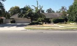 Traditional Sale. Lovely home, located at the San Joaquin Country Club Estates, has 4 bedrooms, 2 1/2 baths, offering formal dining/living room area and spacious kitchen and family great room. Big lot size features quaint courtyard out front, potential RV