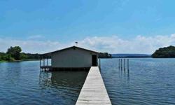 MAIN CHANNEL 3BR/2BA REMODELED WATERFRONT HOME, OFFERS HARDWOOD & SLATE FLOORING, FIREPLACE, KITCHEN WITH GRANITE COUNTER TOPS, ALL STAINLESS STEEL APPLIANCES, LOTS OF CABINET SPACE, EAT IN KITCHEN, BATHROOMS ALSO OFFER GRANITE COUNTER TOPS, NEW OUTSIDE