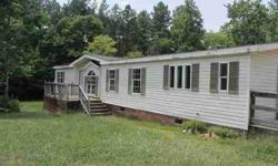 Double wide on nearly acre lot. Offers 3 bedrooms, 2 baths, family room and eat-in kitchen. Minutes to RTP & RDU.Listing originally posted at http