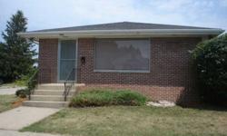 Solid brick 3 BR home in excellent condition. Large lower level family room and main floor laundry. Beautiful laminate flooring throughout; new carpet in family room. Large lot plus extra lot on east side; plenty of parking.Listing originally posted at