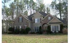 Located in Lake Wylie's Heron Cove subdivision. Sits on a private wooded lot with screened in porch.