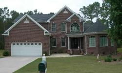 This lovely 5BR/3.5 bath home overlooks the 7th Tee of the Egret course at Carolina National Golf Course in Winding River Plantation. You will absolutely love the open floor plan this home offers. As you enter the Foyer there is an office/den on the right