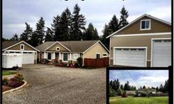 2 homes plus shop on 1 Acre- Puyallup Schools-EZ rental income- Custom built in 2006 by some of the best craftsmen around. 9ft ceilings w/ Cathedral in Living area. Hand scraped Real Oak floors. Knotty alder beadboard cabinets. White painted mill work