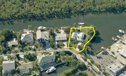 This is a short sale and is not in MLS, so call listing agent now for details. One of the best deals on the water, this remodeled 3 bdrm, 4 bath, pool home in Palm Isles is situated on one of the best waterfront lots. Key features include approximately