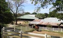 Equestrian Centeron 5 Acresin Loomis, PremierNorthern California Location. Large covered, lighted arena, 30+ stalls, 2 corrals, uncovered arena, tack room, hay storage, room for RV. Previous Boarding and Training Facilities. Comfortable 3 bedroom, 2