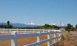 Gorgeous Mt Views and a white fence makes for a beautiful setting. 8.5 acres with 4 bedroom, 2.5 bath lovely home. Set up for horses with corrals and irrigated pasture.Listing originally posted at http