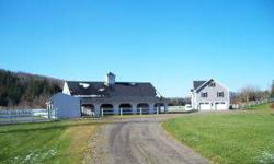 Colebrook - WOW! This property has it all. A large 3 bedroom home with outstanding architectural features, an in-law apartment with 2 bedrooms and a bath, and a 5 stall horse barn with room for 2 more under a lean-to, all on 12+ acres of fenced, premium