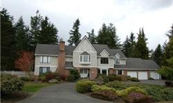 Sunrise View Estates~One of Puyallup's most desirable gated communities!This 3,703 sqft custom built home is on a private, fully fenced .75 lot w/beautiful,manicured landscaping. Main flr has 2 living rms w/2 fireplaces, oversized dining & kitchen