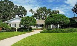 Radiant Renovation in Rose Isle! The very open and versatile floor plan offers gorgeous wood floors, plantation shutters, dentil crown molding, custom wainscoting, designer lighting, travertine fireplace, newer kitchen and baths, newer double paned