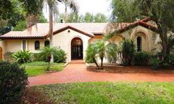 Santa Barbara Mission Style designed for entertaining and Florida living. This home is abundant with architectural features, ample living space and mediterranean finishes. The moment you enter the foyer you know you have arrived somewhere special. Every