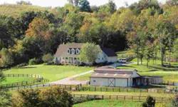 Bring the horses! Never leave home to ride again, the property comes with 11 stalls, riding trails through the woods, a 100X200 outdoor arena, 5 paddocks, hay storage, tack and feed room and wash bay. The house is beautifully situated on the land,