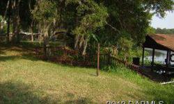3 acres on the st. Johns with over approximately. 300' of water frontage. John Adams has this 3 bedrooms / 2 bathroom property available at 1705 Camp South Moon Road in Astor, FL for $499900.00. Please call (386) 258-5500 to arrange a viewing.Listing
