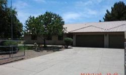 Fabulous acreage property located in the heart of Gilbert! No HOA. County Island. Horse Property! This spacious home offers an open layout, 5 bedrooms, neutral colors throughout, tile in all the right places, oversized master bathroom with separate snail