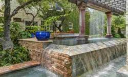 Outdoor living like no other! Magnificent back yard with pool, spa, sport court and kitchen - your own personal oasis! As you enter the cul-de-sace to your private property you are welcomed by a beautiful 2-story stone home with 2nd story balcony
