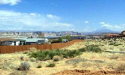 This is a good building lot with views of Lake Powell, the Kapairowits Plateau and Navajo Mountain. There are several homes presently being build that are priced at $550,000. This lot is located in an area where the homes have to be at least 1,400 SF.