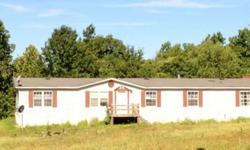 Large, 1,900+ (sq. ft.) 4BA/2BA Manufactured home on 3 Acres. 2 Living Rooms, Large Eat-In Kitchen, Office, Large Master Bedroom and all on a nice level lot. Located just outside of Eldon. Home needs some TLC, but would make a Great Investment. (Bank