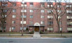 Lovely 1 bedroom, 1 bath brick condo unit. This unit features a large living room with plush carpeting, galley kitchen with tile flooring, pantry closet and tiled backsplash. The bedroom has a large window that provides vibrant natural lighting and a