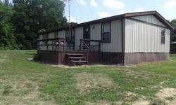 This 1983 Schult manufactured home has 3 bedrooms, 2 baths, and plenty of living space. Set on 1.273 acres, it's perfect for the home owner that desires country living but still wants all the convenience of town just 10 minutes away. Property has pond