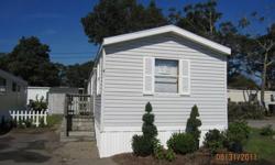 Why rent....when you can purchase this affordable, easy maintenance 2 BR mobile home. Features of this home include new 50 gal. hot water heater, new gas stove, new refrigerator, wall to wall carpeting, natural gas heat, washer/dryer hookup in kitchen,