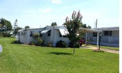 Searching high & low for an affordable home? Efficiency can be beautiful! so much for so little in this tastefully furnished mobile home on owned land. Additional bonus room off the utility area and great neighborhood within walking distance to stores and