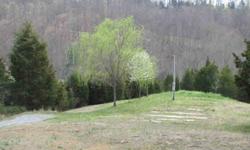 Secluded 9.42 acre mountain tract offering well established drive way to numerous hill top home sites. Choose from an established site near the front of the property that offers water line, septic, and power or follow the existing road way up the mountain