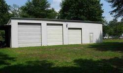 LARGE 60X30 METAL SHOP LOCATED ON OVER HALF AN ACRE COMPLETELY FENCED IN. SHOP HAS 3 SEPERATE ROLL UP DOORS RANGING IN SIZE FROM 12X12,12X10,10X10 AND A REGULAR ENTRY DOOR.
Listing originally posted at http