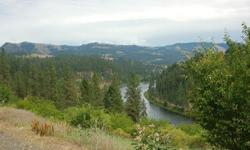 Enjoy amazing views of the Clearwater River from this 7+ acre building lot just 5 minutes from Kamiah, Idaho. There is access to the Clearwater River through the adjacent BLM property. A building pad is already in so it is ready for one to build your