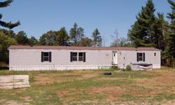 Enjoy life out in the country in this nice mobile on 2.5 acres. Conveniently located off of Hwy BB, this property is just a few minutes away from Plainfield! Hot tub included in sale. Seller financing is offered for ANY credit and ANY income! Contact Drew