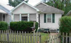 This would be a wonderful starter home or a home to downsize to! You're almost ready to with the refrigerator and range included! With two bedrooms and one back, this cozy home provides plenty of room for you! You'll have easy access to all of Evansville