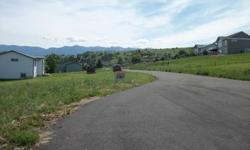 Great Building Lot Close to All Amenities and Peek-A-Boo Views of Flathead Lake! Must see!