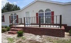 North Lakeland, 3 bedroom, 2 bath mobile home on 1.6 acres zoned for horses. Home is in good condition, split bedrooms, formal living and dining room, large kitchen with island and inside laundry room. Acreage is completely cleared, fenced and has 2 sheds