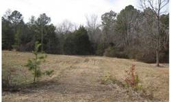 Wooded acreage bordered by branch, 3 approved perk sites, county water and power on property,Listing originally posted at http
