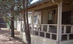 Tons of potential with this 1978 two bedrooms, two bathrooms doublewide manufactured home on two lots! Diane Dahlin is showing 3363 Rim Lakes Dr in OVERGAARD, AZ which has 2 bedrooms / 2 bathroom and is available for $49900.00. Call us at (928) 535-3656