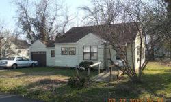 Grandma's house! Affordable 2 bedroom on Corner lot. Handycapp access. Garage. Paved drive. Vinyl siding. Thermal pane windows. Storm doors. Roof 2 years old. Central heat. Seller willing to add central air, fence etc for additional price and include in