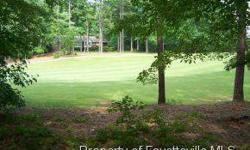 Watch the golfers play on a choice wooded Golf Course Lot on the 6th Fairway of the Creek Course. Lot in nice section of Carolina Trace that has pool and tennis close by. See additional pictures of lot and golf views for home that can be built on now or