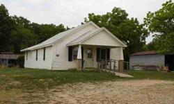 Short Sale Opportunity. 2-3 bedroom, 1 bath, vinyl sided farm house with partial basement on 3.3 acres and only 10 miles to town on a paved highway. There is a 30 x 40 shop building with a concrete floor.Listing originally posted at http