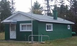 Quiet laiitle getaway is what you'll find with this property. This one bedroom camp with a full bathroom has an open concept living room, dining area and kitchen area. Shed/workshop with cement floor and electricity, lean to for wood, outhouse (still