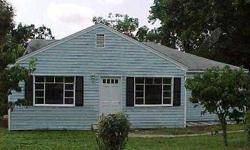 Conveniently located 3 bedroom, 2 bath home on North McCrary Street. Hardwood floors in living room, eat-in-kitchen, some replacement windows, heated enclosed porch with utility/laundry area. Selling as is. Buyer should verify all information and inspect