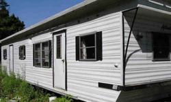 12x50 mobile home on wheels, ready to move. Has a newer roof, hot water heater, propane fernace. Comes with a stove and refrigerator, window awnings, and aluminum steps. Have title. Asking 4000 or best offer.