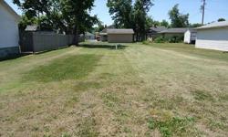 Lot in a nice neighborhood. Utilities are on the property. The city says that a double wide could be placed on the lot as long as it is at least 1200 sq ft - no single wide. Check with the city to confirm. 50X120 CALL DIANA, PROPERTY WITH TLC 618-923-4002
