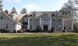 Taking its rightful place as one of Short Hills' most distinctive homes, this grand 6 bedroom center hall Colonial was newly built in 2004 and is located on the most prestigious streets in town. Its top quality construction has unique architectural
