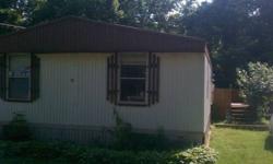 1981 Fiesta mobile home 50' Long X 24" Wide, 3 Bedroom, 2 bath w/ a back deck, fenced in yard, hot tub and VERY large shed. It is located at Stanly and Guy Mobile in Marietta home park. If you are not moving the home and wish to live at the park the lot