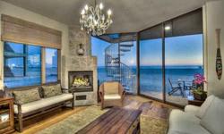 Stunning move-in ready beach front Tuscan style home with world class ocean, pier, islands, and coastline views. Enjoy 365 days of resort like living in this one of a kind beach front home. Floor to ceiling windows throughout frame a priceless picture of