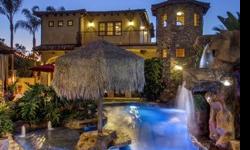 SELLER MOTIVATED! This extraordinary and breathtaking romantic revival evokes the mood of a Tuscan colonial enclave. With it's artful blend of exquisite detailing and authentic imported materials, this estate offers an enchanting array of stone cobble,