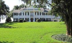 This Is Probably The Most Desirable Property Ever Offered On The Chain of Lakes! Beautiful 2 acre Lot With Over 800' Of Water Frontage with Crystal Clear Water and White Sand Beach. Classical Revival Style Estate Has Numerous Custom Features Like Hardwood