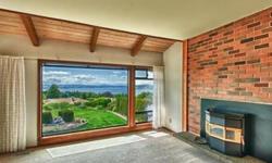 This beautiful home offers panoramic sound & olympic mountain views with desirable western exposure, this amazing view is seen from nearly every room in the house.
David Gala & The Hume Group has this 4 bedrooms / 2 bathroom property available at 1752