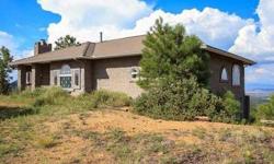 This is a special opportunity for an amazing 4.6 acre hilltop property with spectacular panoramic views of city lights, Granite Mountain, Thumb Butte, San Francisco Peaks! This home is a partially completed 4863 square foot home. The seller lives on the